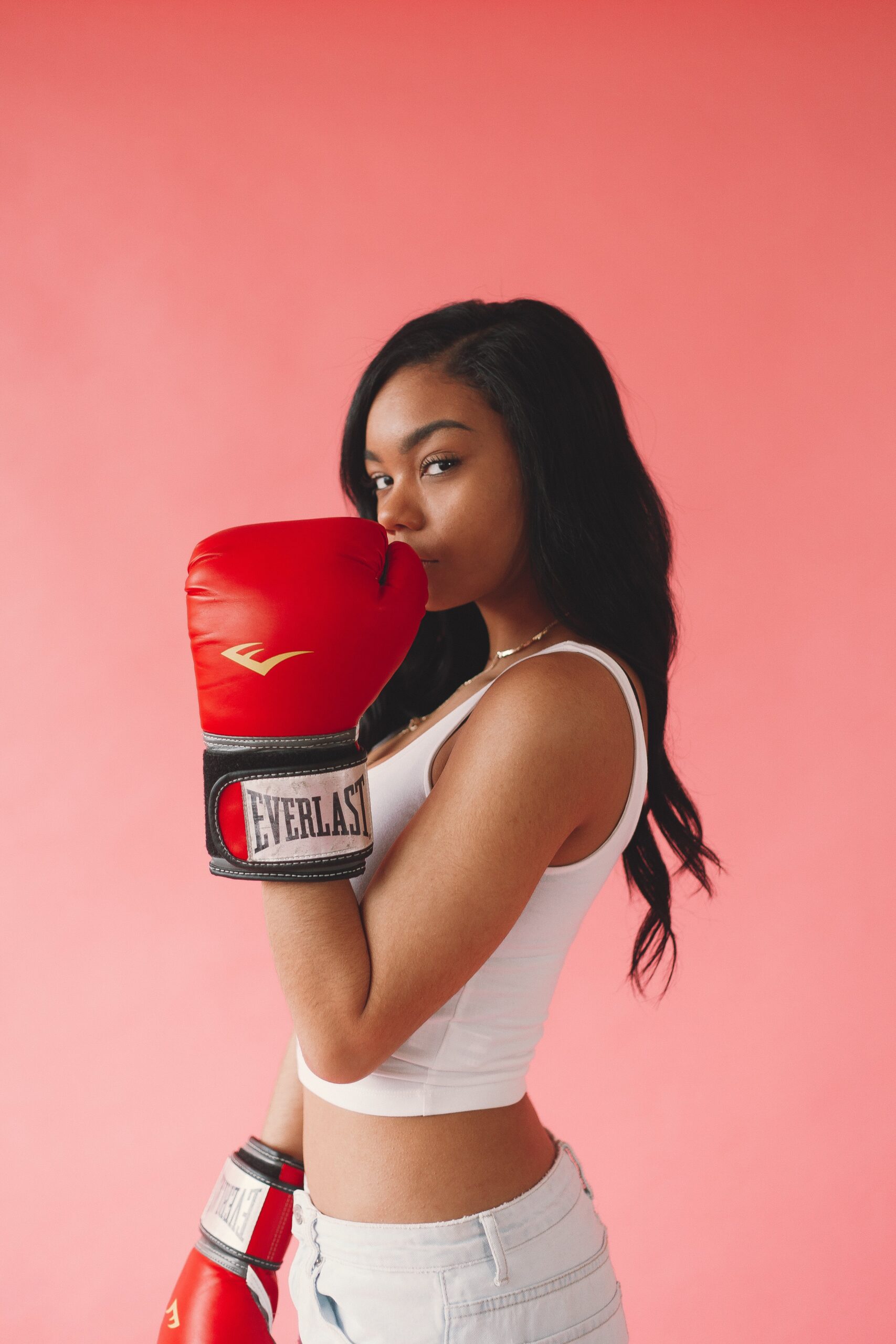 Photo Of Woman Wearing Red Boxing Gloves